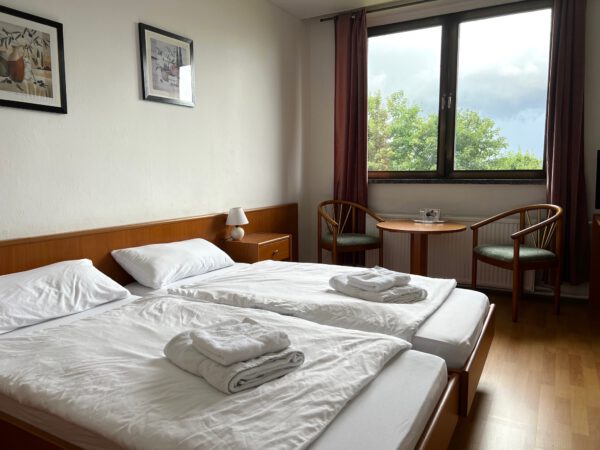 Doppelzimmer mit Seeblick - 1_Personen optional 1_Kind